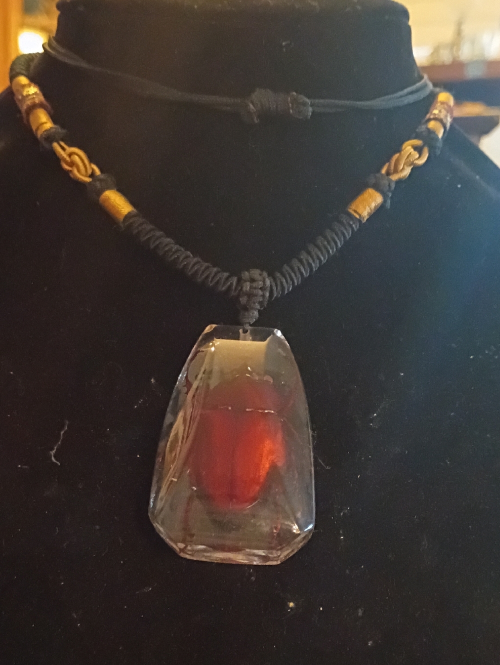 Handcrafted Black Cord Necklace with Red Glass Pendant and Gold Accents
